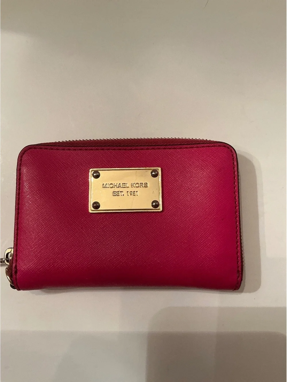 Michael Kors Pink leather zip-around wallet with logo and card slots